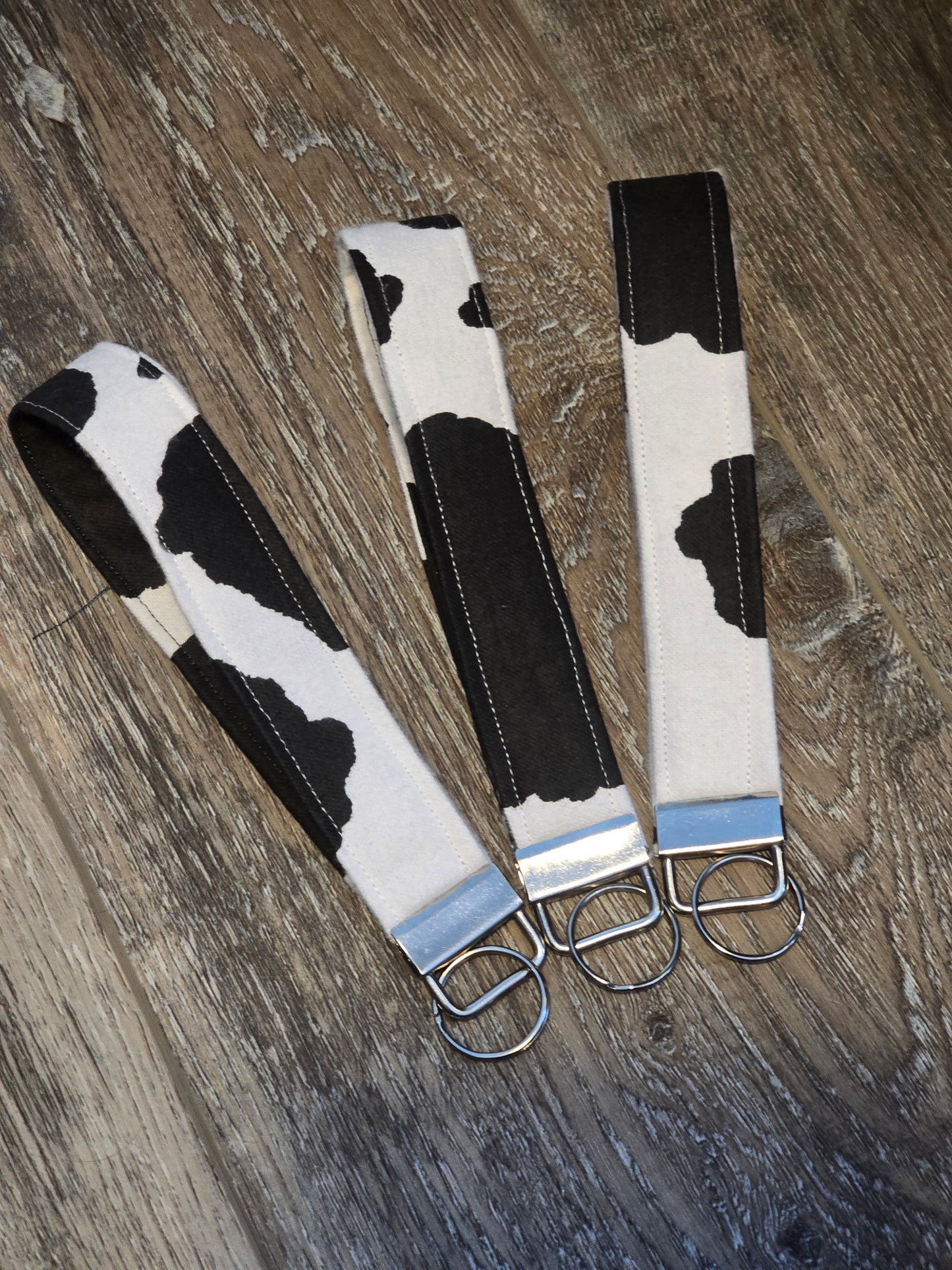 Black Cow Print Wristlet